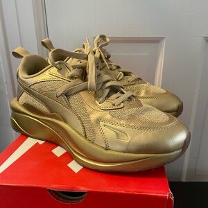 Gold Puma Women’s sneakers